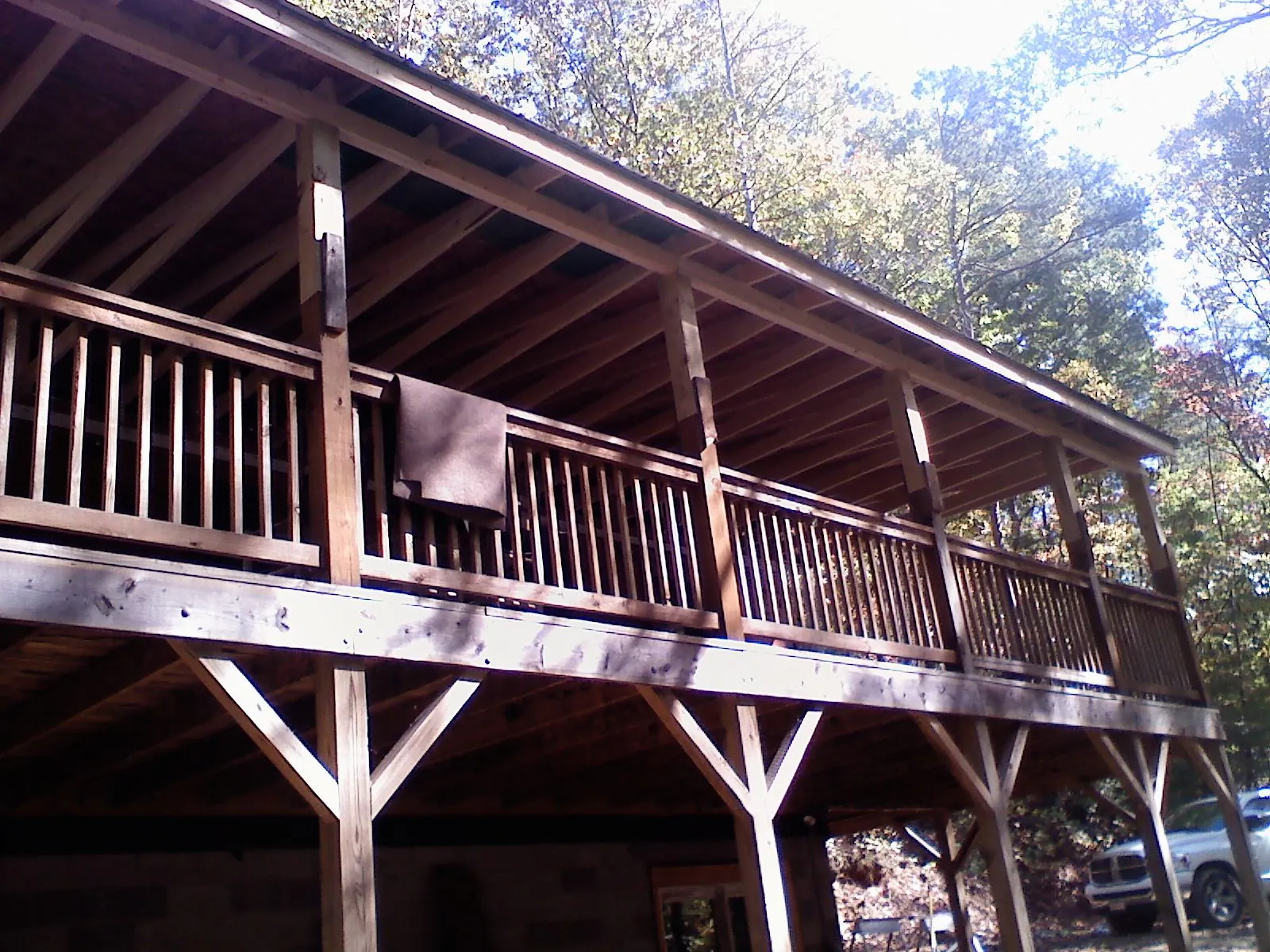 Timber framing under a new elevated porch and deck — Roof Leak Repair in Frankfort by Roofing Brothers